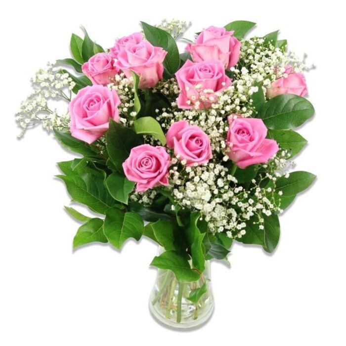 A simple, cylindrical glass vase holds a carefully crafted bouquet of pink roses and baby's breath, photographed against a clean white backdrop that allows each flower and leaf to be easily imagined. Around ten to twelve roses form the central cluster, their petals unfurling in gentle spirals of soft pink, with some blooms showcasing slightly deeper rosy centres that add quiet depth to the palette. A few roses are fully open, their velvety layers forming wide, cup-like shapes, while others are still in earlier stages of bloom, suggesting freshness and the sweet beginnings often associated with welcoming a newborn. Interwoven among the roses are stems of white baby's breath (Gypsophila), branching into tiny, cloud-like clusters of blossoms that seem to float around the larger flowers, lightening the overall feel of the arrangement. Framing this mix of pink and white, deep green rose leaves curve gracefully outward, their glossy surfaces catching the soft studio light and creating a natural contrast that grounds the design. Through the sides of the clear vase, you can see the straight, green stems submerged in clean water, a sign of professional conditioning and care. The lighting is bright and even, with minimal shadows, bringing attention to the velvety texture of the rose petals and the airy delicacy of the Gypsophila. The overall impression is one of calm joy and gentle celebration, an arrangement that seems ideal for sending congratulations to new parents in Grove Park, brightening a windowsill near Grove Park Station, or adding a soft, welcoming touch to a baby's room overlooking the leafy streets that lead toward the river.