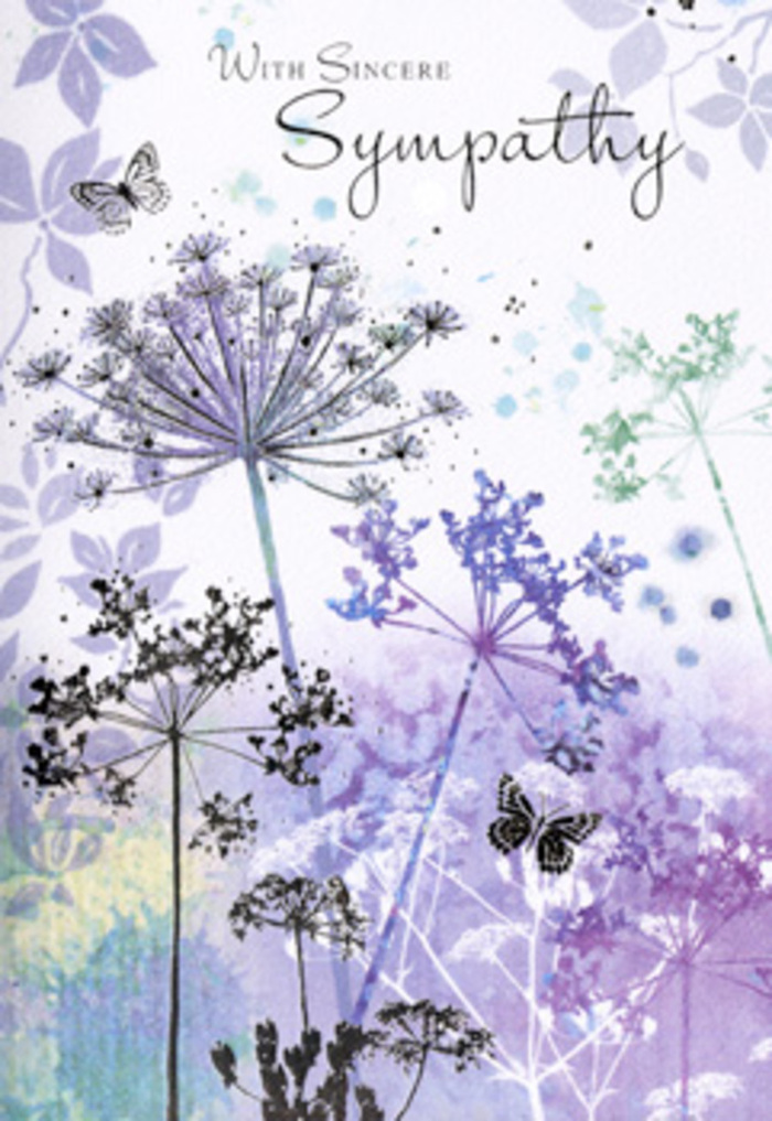 There is an almost meditative stillness to the artwork within this sympathy card, as though you were gazing over a calm riverbank scene near Grove Park just after a soft shower. Tall, refined stems of wildflowers emerge from a base of muted tones, their narrow lines arching gently before branching into delicate, umbel-shaped flower heads. These blossoms are shaded in a palette of soft lavender, powdery blue, and cool silvery green, each petal and tiny floret lightly washed to preserve a sense of air and space. The background is a subtle gradient of muted purple and gentle green, blurred as if seen through a window kissed by fine raindrops. In this softened landscape, hints of additional stems and ghostlike blossoms appear and disappear, building depth without crowding the eye. Butterflies hover with quiet poise among the flowers, their wings rendered in semi-transparent strokes of violet and blue that mimic the fleeting flicker of movement you might glimpse along the Thames Path. Light across the image remains diffuse and kind, flowing over every stem and petal with a consistent, calming tone. The whole composition seems to murmur of remembrance and care, offering solace rather than stark sadness. It echoes the feeling of a thoughtful neighbour in Grove Park arriving with a simple bouquet and a few gentle words. This card's design pairs beautifully with understated funeral arrangements and sympathy flowers, reflecting the same reverence and compassion we strive for in every condolence piece prepared for families throughout Grove Park and the surrounding communities.