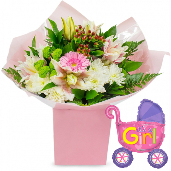 A beautifully coordinated new baby girl gift ensemble is shown against a bright, uncluttered white background, as if ready to be sent from a local Grove Park florist to delighted new parents. The focus is a lush floral arrangement rising from a tall, square, pastel pink gift box, its colour soft and soothing. From within the box, a carefully balanced mix of blooms spills outwards. At the very centre, a bright soft pink gerbera daisy forms a striking focal point, its round, layered petals radiating like a friendly burst of sunshine. Surrounding it, full white chrysanthemums create generous domes of petals, giving the bouquet volume and a sense of calm purity. Interlaced between them are alstroemeria lilies tinged with light pink and white, their elongated, slightly recurved petals decorated with fine, natural speckles that lend an artistic touch. A closed, creamy yellow lily bud extends gently from the top of the arrangement, hinting at flowers that will gradually unfold in the days after the baby girl's arrival. Among the larger blooms, lime-green button flowers provide crisp texture and a fresh, modern contrast. Deep green foliage and soft fern fronds frame the bouquet, adding depth and a hint of woodland softness, reminiscent of the greenery found in nearby Chiswick or along Grove Park's leafy avenues. Small clusters of red hypericum berries nestle among the stems, giving tiny, jewel-like flashes of colour that enrich the palette. The entire composition is held together with layers of pastel pink tissue paper and a sheath of clear cellophane that catches the light, creating a freshly arranged, just-delivered look. To the right of the bouquet hovers a playful metallic foil balloon shaped like a classic baby stroller. It is predominantly hot pink, with a curved purple hood and rounded purple wheels decorated with colourful spokes. Along its side, bold yellow and green letters declare It's a Girl!, surrounded by subtle heart details. The overall effect is one of warmth, tenderness, and celebration, perfectly suited to marking a baby girl's arrival in Grove Park.