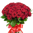 A striking, sumptuously dense bouquet of approximately fifty to sixty red roses commands attention against a pristine white background. Each flower is perfectly formed, some tightly furled in anticipation, others blooming with opulent layers that invite the eye to wander and the mind to dream. Interlaced with these vibrant blooms are glossy, dark green leaves, their subtle sheen reminiscent of Grove Park's leafy charm. The expertly bound stems are finished with a lavish, bold red satin ribbon, tied in an elaborate, multi-loop bow, its long ends adding a flourish of celebration. Under soft, natural light, the arrangement glows, displaying a harmonious gradation of rich reds, from vivid scarlet to deep burgundy. This bouquet is more than a simple gift-it's an eloquent statement of love, beauty, and heartfelt appreciation, perfectly suited for anniversaries, Valentine's Day, or any momentous event celebrated within the Grove Park community. Bringing together artistry, precision, and affection, this arrangement captures the essence of what makes Grove Park Florist cherished by those seeking to turn moments into memories.