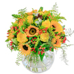 Radiating the summery brilliance that characterises Grove Park, this bouquet is a tribute to the lively warmth of the season. Sunflowers claim the center, their richly hued petals and dark, velvet eyes imparting a vibrant cheer reminiscent of a stroll along Thames Path. Intertwined among them, yellow roses open in creamy, soft spirals, each bloom promising heartfelt joy and celebration. Bright pops of orange and clusters of gleaming red berries are scattered through the arrangement, contrasting playfully against springs of fresh, feathery ferns and polished, leafy greenery. The bouquet is lovingly presented in a round glass vase, letting the stems cross in an artful, natural tangle visible beneath the surface. The fragrance is gently sweet, lifted with green and floral notes that call to mind local garden scenes. Whether conveying a joyful birthday wish, a thoughtful thank you, or simply bringing light into a home on Spencer Road, this bouquet is designed to delight-offering a warm, sunlit welcome from Grove Park Florist.