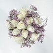 A study in tranquil beauty, this bouquet from a Grove Park florist features plush ivory roses paired with a delicate halo of pale lavender statice-an arrangement as calming as the river breeze along Hartington Road. Each rose, soft and richly petaled, opens slowly to reveal an inviting heart, while the statice flutters around the edges in gentle arcs, echoing the movement of morning air through local gardens. The effect, in the generous light of a west-facing window, is quietly enchanting: white merges with ethereal purple, creating a pure and hopeful palette ideal for weddings, heartfelt congratulations, or gentle gestures of comfort. The scent is tender and uplifting, with a whisper of fresh greenery and gentle floral sweetness, much like the fragrance of spring in the nearby alleys and parks. Crafted with thoughtful artistry, every element in this bouquet is a testament to Grove Park's inviting spirit-offering a promise of sincerity, comfort, and new beginnings for anyone who receives it.