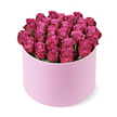 With a hush of luxury, this bouquet of dozens of fuchsia roses rests in a light pink hat box, the form pushing the edges of size and grace. The roses sit in a tight, rounded dome, their petals a study in velvet-the heart of magenta deepening toward berry at the edges. The box's pale pink exterior wears a soft matte finish, and only a whisper of dark green leaves peeks through, allowing every bloom to glow and draw the eye with steady, confident prominence. The arrangement is captured from a slightly elevated perspective against a pure white plane, so the colours read as rich, celebratory, and intimate all at once, a moment frozen in time for a cherished recipient.

This is a gift meant to be seen in a quiet moment of joy-an indulgence for a birthday, an anniversary, or a milestone that deserves something memorable. In Grove Park, a local florist stitches the details with careful hands: symmetry in the dome, even tension at the top arc, and a balance between bloom weight and the hat box's soft symmetry. It's designed to travel with care for same-day delivery to nearby streets and homes, bringing immediate theatre to a doorstep and a smile to a room. The scent of fresh roses rises with the lid, the cool, velvet-soft petals inviting a gentle touch, and the overall silhouette lingers long after the flowers begin to soften. This arrangement embodies romance, luxury, and quiet celebration, a refined statement piece that elevates any occasion.