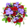 Captured from an overhead angle against a bright white surface, this bouquet appears as a rich, circular emblem of romance, its deep reds and regal purples radiating outward like a carefully orchestrated symphony. At the centre, velvety red roses form dense clusters, their spiral petals wrapped tightly enough to suggest both intensity and longevity, making the bouquet a natural choice for declarations of love or important celebrations in Grove Park. Woven through these classic blooms are generous Vanda orchids, each one a study in lavender-purple, with wide, flat petals lightly textured and mottled with darker violet markings that lend a touch of exotic drama. Encircling this focal pair, violet lisianthus flowers unfurl with softly ruffled edges; some blossoms are open and full, while others remain as elegant buds, which adds a sense of progression and life to the arrangement. Scattered among them, smaller lilac buds and delicate florets provide quiet accents, gently bridging the intense colours. The entire bouquet is framed by a collar of greenery, where dark, glossy rose leaves sit close to the blooms, and slim stems of silvery-green eucalyptus curve outward, bringing a cool, modern feel that softens the richness of the palette. Fine filler greenery, composed of many tiny leaves, threads in and out of the blooms, giving texture and fullness without stealing focus. At the base, a suggestion of silvery mesh wrapping peeks out, hinting at a refined finish perfect for same-day delivery to homes, cosy pubs, or intimate celebrations along the tree-lined streets of Grove Park. The mood is indulgent and romantic, with a sense of careful craftsmanship evident in every petal.
