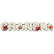 The photograph shows a serene and heartfelt GRANDMA funeral tribute, the word formed in strong block capitals that rest in a single, even line as though arranged in front of a coffin or on a stand at a Grove Park farewell. Each letter is constructed from a compact mass of white cushion chrysanthemums, every small bloom positioned closely to the next so that the surface looks like a plush, uninterrupted blanket of petals. This dense, snowy texture contrasts beautifully with the faint edge of pale purple ribbon or backing that outlines each letter, adding a whisper of muted colour and ensuring the word remains clearly defined against the bright white background. Vivid red floral details bring a sense of love and remembrance: at the start, the G features a rounded cluster of deep red roses together with a unique variegated red-and-ivory calla lily, its graceful, fluted petal giving a touch of elegance. The first A is marked with a single red anthurium at its base, its smooth, heart-shaped form symbolising deep affection. Positioned centrally, the M carries another grouping of red roses and a second red anthurium, while the final A displays one last red anthurium bloom, providing a gentle echo that leads the eye across the tribute. Behind the letters, a dark green structural frame offers discreet support, almost disappearing from view so the flowers remain the clear focus. Created in the style of Grove Park Florist, this bespoke GRANDMA arrangement feels peaceful and sincere, a fitting floral tribute for families in Grove Park who wish to honour a grandmother with a personalised final gesture.