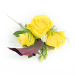 Three sunny yellow roses form the joyful heart of this handcrafted corsage, photographed against a clean white backdrop so every petal and texture reads clearly. The central rose is fully open, its buttery layers unfurling like a small sun; two slightly smaller roses cradle it on either side, their spiralling petals tipped with a faint sheen where tiny clear crystal studs have been placed in each centre, catching and reflecting light like dewdrops. A single, sculptural calla lily in a deep plum or burgundy curls away beneath the roses, its satiny throat turning the composition toward a graceful downward sweep and creating a dramatic, elegant contrast to the luminous yellows. Airy asparagus fern fronds and broader, glossy deep-green leaves weave through the blooms to give softness and structure, while small, button-like white chrysanthemums nestle into the gaps for gentle highlights of cream. A couple of closed green buds at the lower right promise natural growth, and a hint of translucent, lacy white fabric behind the left rose adds an ethereal, bridal whisper of texture. The overall scent is suggested - warm, honeyed rose with fresh green notes - and the arrangement feels warm, confident and celebratory, suited for a summer wedding, prom or graduation. Made to be worn, the piece balances sparkle with natural beauty so it stays elegant in movement and photos. Locally inspired for Grove Park wearers, this corsage translates well from morning light by Chinbrook Meadows to evening receptions along Baring Road, and its workmanship is steady enough for a day of hugs, dancing and memory-making.