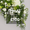 From Grove Park Florist, this Florist Choice Spray in pristine white and vibrant greens rests against a pale grey backdrop, ready for delivery across Grove Park and surrounding areas. The bouquet feels lush and generous, its fullness seeming to spill softly outward in a controlled cascade, a sign of careful design. From a slightly overhead vantage, it reveals a tapestry of textures: large hydrangeas with cloudlike clusters occupy the top third and center, their petals catching the light; interspersed white roses show a journey from bud to bloom, lending elegance and romance; slender lisianthus rise on the left and lower right, their white cups edged with the faintest green. The greens are bold and varied-feathery fern fronds curling along the bottom and right, cool grey-green eucalyptus providing a silvery whisper, and darker ruscus leaves offering muscular contrasts. Tiny green buds punctuate the arrangement, hinting at life and renewal. A crisp white border panel overlays the middle of the composition, bearing Florist Choice in a graceful script, with SPRAY rendered in clear uppercase letters beneath, and a bold ?100 beneath separated by thin lines. The text panel is semi-transparent, so the verdant stems underneath remain visible, a subtle reminder of the bouquet's freshness. This image speaks of a premium floral spray, ideal for memorials, sympathy tributes, or refined gifts, and it carries the quiet confidence of Grove Park's floristry craft. It's designed for straightforward ordering and delivery, with availability for same-day service across nearby streets such as Honor Oak Park, Downham, and Lewisham, reflecting our neighbourhood's belief in accessible, fresh blooms.