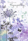 This sympathy card unfolds like a soft, visual poem inspired by nature, much like the tranquil patches of greenery and riverside paths around Grove Park on a still evening. From the lower edge, slim stems of wildflowers rise with effortless grace, each one crowned with an umbel of tiny, lace-like florets. Their colours drift through a quiet spectrum of lavender, indigo, and misty blue, touched with cool, silvery green that lends a sense of calm. The background is a gentle watercolour wash, where muted purples melt into soft greens without clear borders, as if the flowers were emerging from a dreamy morning fog. Faint outlines of additional blooms and foliage hover in the distance, adding dimension while keeping the scene wonderfully uncluttered. A few butterflies float between the stems, their delicate wings only lightly defined, brushed with transparent hues that convey both fragility and hope. Nothing in the image feels rushed or insistent; the light is evenly soft, without harsh contrast, encouraging the eye-and the heart-to rest. The overall mood is one of quiet consolation, like the comfort of sitting with a close friend in Grove Park who understands the depth of your loss without needing many words. Just as we select gentle tones and natural textures for funeral flowers and sympathy tributes, this card offers a respectful, nature-inspired expression of support, making it a thoughtful accompaniment to any arrangement sent to honour a life and bring a measure of peace to grieving families nearby.
